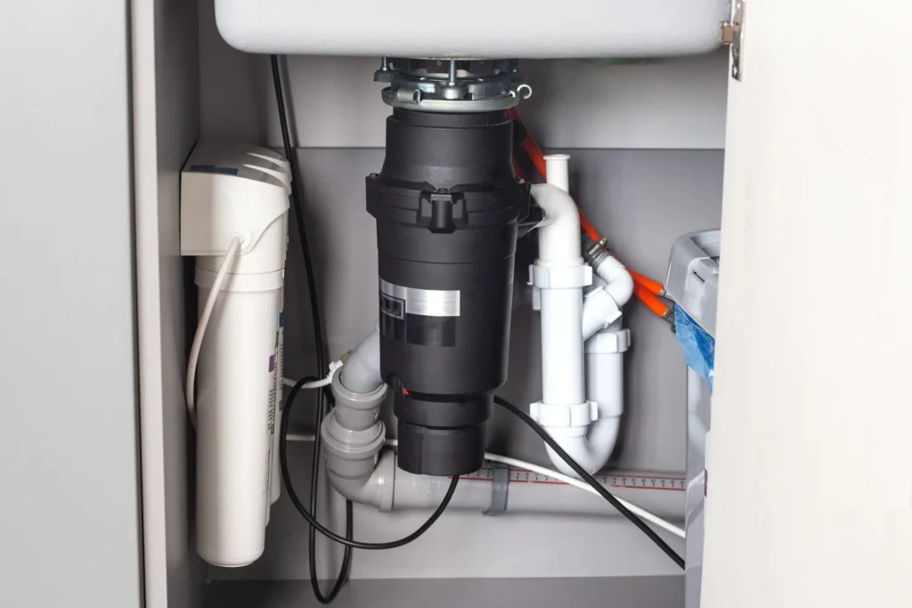 Garbage disposal under kitchen sink